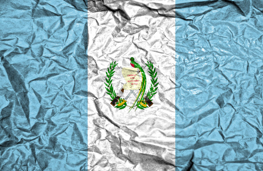 Guatemala vintage flag on old crumpled paper background Guatemala vintage flag on old crumpled paper background