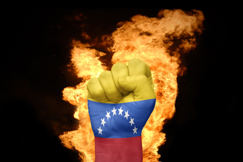 fire fist with the national flag of venezuela fire fist with the national flag of venezuela