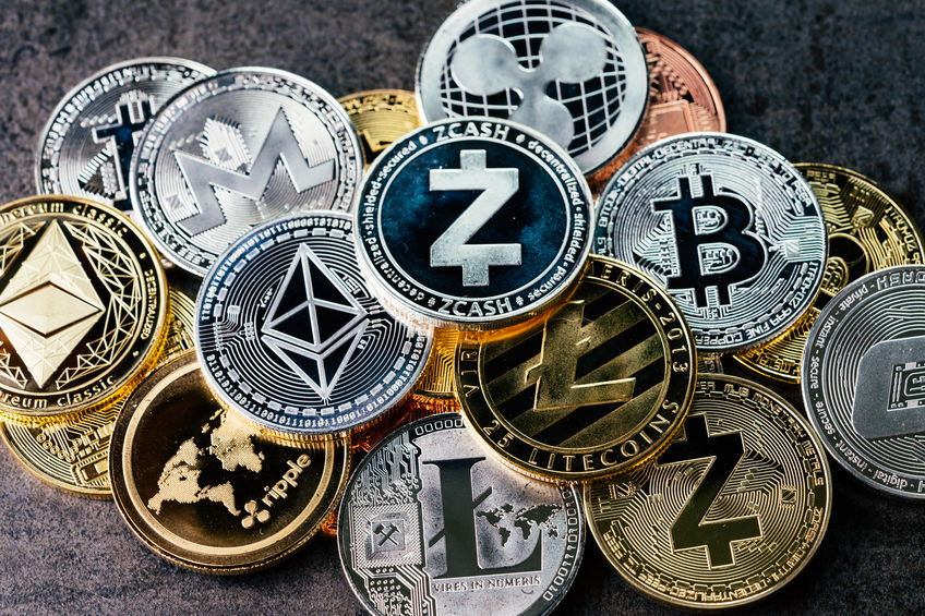 Crypto currency background with various of shiny silver and gold