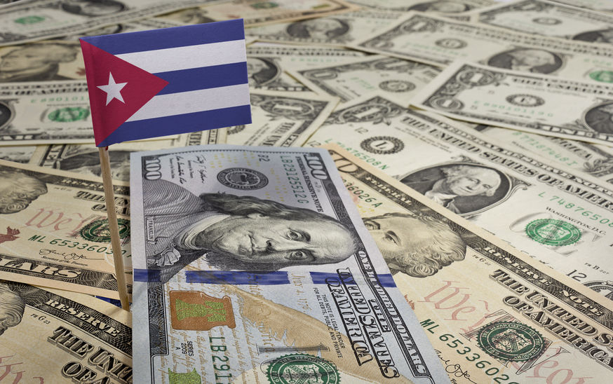 Flag of Cuba sticking in various american banknotes.(series)