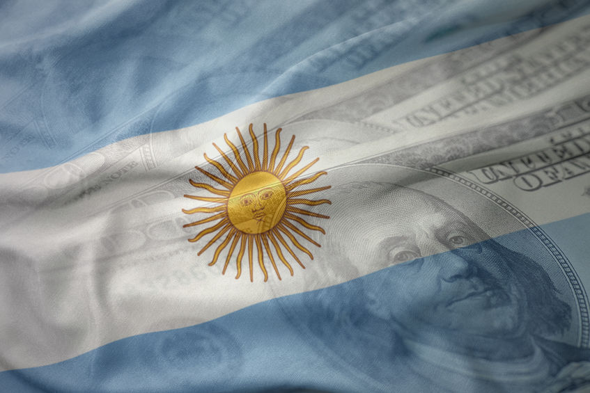 colorful waving national flag of argentina on a american dollar money background. finance concept