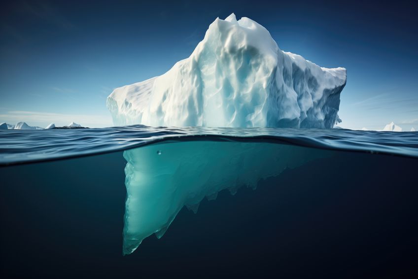close up view of a floating iceberg in a cold sea